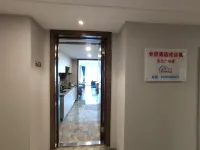Quanxin hotel apartment (Taizhou Yulan Plaza store)