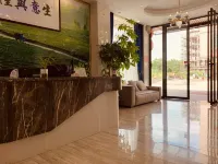Xingfuli Xilai Holiday Apartment