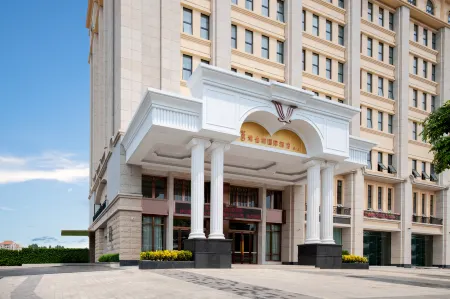 Vienna International Hotel Отели в г. Учуань