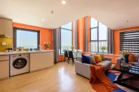 Yunhai Bay Ocean View LOFT Holiday Residence (Jinmao Mall, Qingdao Station)