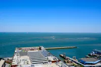 Yunhai Bay Ocean View LOFT Holiday Residence (Jinmao Mall, Qingdao Station)