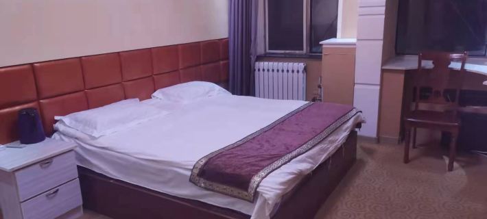 Humaxiyuan Business Hotel โรงแรมในหูหม่า
