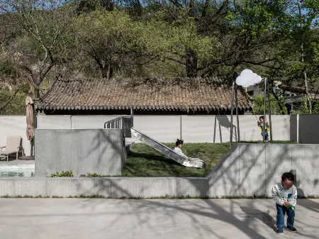 Zoushen Inn WanderHotel Private Hot Spring Vacation Apartment Отели рядом с достопримечательностью «Xizhuangcun»