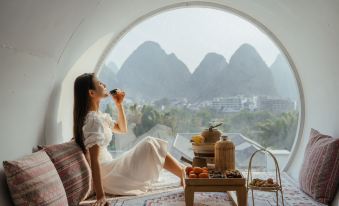 Yangshuo Antiya Hotel (Yulonghe Shili Gallery Store)