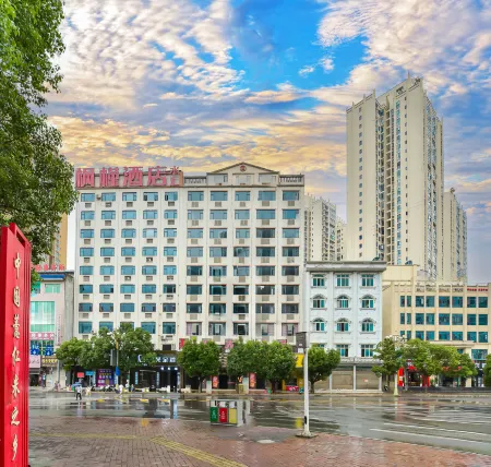 Fengjin Hotel (Xingren Plaza) Отели в г. Синжэнь
