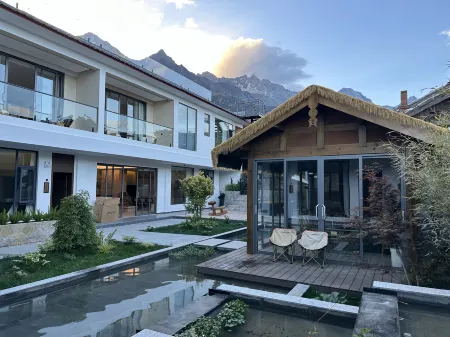 Jade and Snow Courtyard Отели рядом с достопримечательностью «Yuzhu Qingtian Scenic Resort»