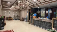 Xingyi Qiaofu Hotel - خدمة نقل من وإلى المطار