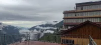 Old Mudeng Jinlin Tea Factory Inn - vue sur la montagne