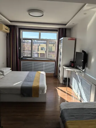 Tieli Songhai Guest House Отели в г. Тьели