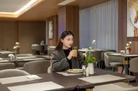 YongNingHuiPlatinumZunHotel - servizio colazione