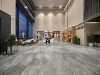 Elong Hotel (Qingdao Oriental Movie Metropolis فنادق في تشينغ داو