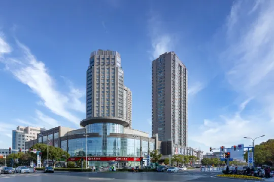 Grand Rezen Hotel Merryland Changshu Отели рядом с достопримечательностью «Shimei Garden»