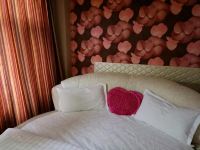 沈阳馨月时尚主题宾馆 - 温馨圆床房