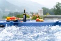 Huangchuan Zhuyun Xuju Hot Spring Homestay - 온천