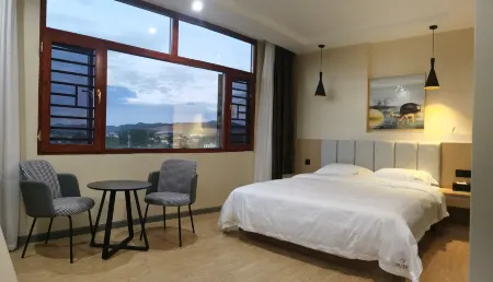 Ludian Yidu Hotel Отели в г. Лудян