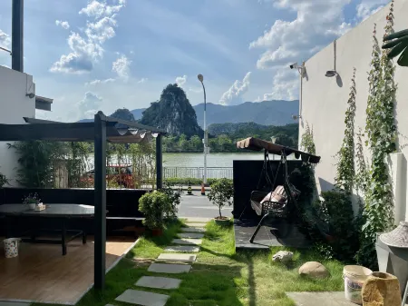 Zhaoqing Shiyanshe Homestay Отели рядом с достопримечательностью «Qixingyan Archway Square»