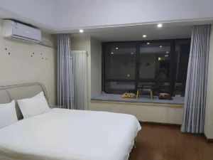 Piaopiao Homestay (Anyang Wanda Plaza)