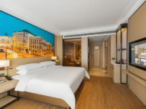 Vienna International Hotel (Genghong Avenue Branch, Gedian Development Zone) فنادق في أه جَو