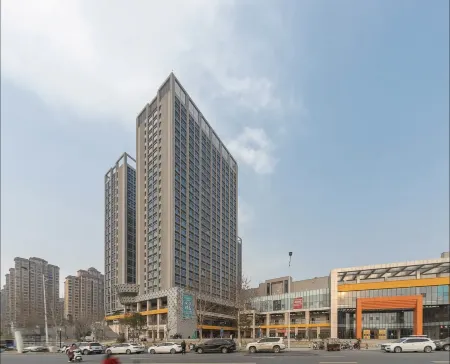 Qixin Homestay (Gongyi Zhengshang Haobuska Branch) Отели рядом с достопримечательностью «Kang Bai Wan Zhuang Yuan»