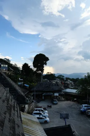 Mangjing Girl Teahouse Homestay (Bajiao Tower) Отели рядом с достопримечательностью «The Old Bulang Ethnicity Village of Wenji»