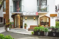 Zhujian Yitang Guesthouse Hotel a Huanglong Sports Centre