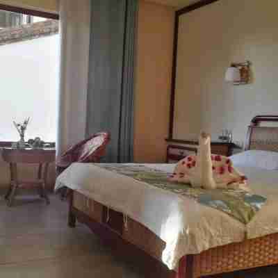 勐海宇照空間客棧 Rooms