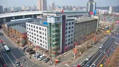 Huashipai Business Hotel Hotels near North and South Korean Style Street