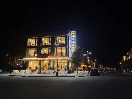 Libo Xiaoqikong Mountain Lodge Отели рядом с достопримечательностью «Wolong Pond»