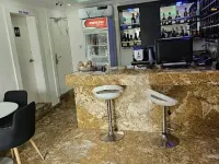 Luxol Homes and Suites - bar