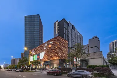Poltton International Apartment (Guangzhou Zhishicheng Wangcun Subway Station) Các khách sạn gần Guangdong Polytechnic College of Agriculture， Industry and Commerce (East to Qiaojian Lvye Mountain Villa)