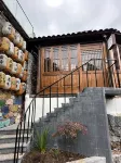 Riverside Courtyard Log Cabin Homestay - Romantic