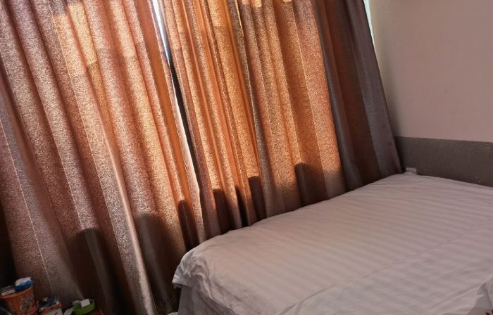 Gongzhuling Riyexing Business Hotel
