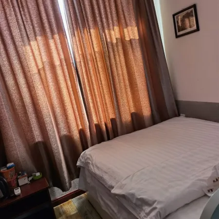 Gongzhuling Riyexing Business Hotel