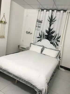 喜家房屋出租民宿（茂名石油化工學院西城校區店） 鄰近石金錢龜的酒店