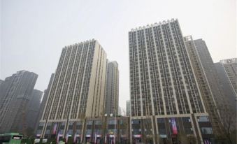 Muxin Hotel (Zhengzhou Meijing Longmen Qilihe Subway Station)