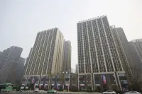 Muxin Hotel (Zhengzhou Meijing Longmen Qilihe Subway Station) Hotels near Fu Tower