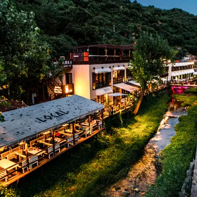 Lotus‘s Secret Hotel Отели рядом с достопримечательностью «Великая Китайская Стена (Ма Тьян Ю)»