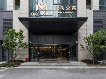 Shanghai Xiaomao Apartment Отели рядом с достопримечательностью «Shanghai Jiguang Polytechnic College»