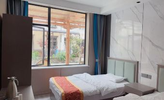 Wenchuan Xinghong Garden Theme Inn