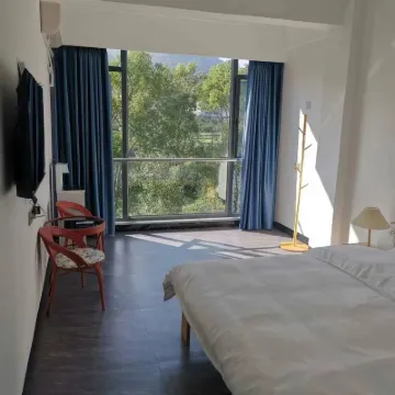 Yuxing Farmstay Hotel berhampiran Hongcheng Taohua Ecological Garden