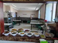 Bei'an Heshunyuan Business Hotel - فطور