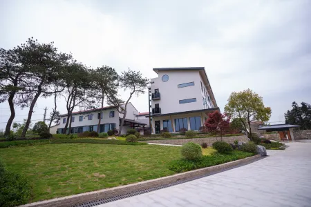 Lüyin Dongyu Hezhu Отели рядом с достопримечательностью «Mulan Grassland»