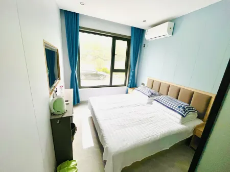 Huguan Jiujiayi Farm Inn Отели рядом с достопримечательностью «Jiulongdong Sceneic Area»