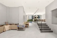 Jinshan International Hotel (Xingyi High-Speed Railway South Station Wanfenglin Airport) - พร้อมอาหารเช้า
