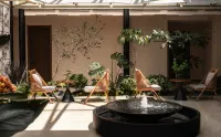 Qingman · Aesthetic Designer Homestay (Yiren Ancient Town Branch) - parking