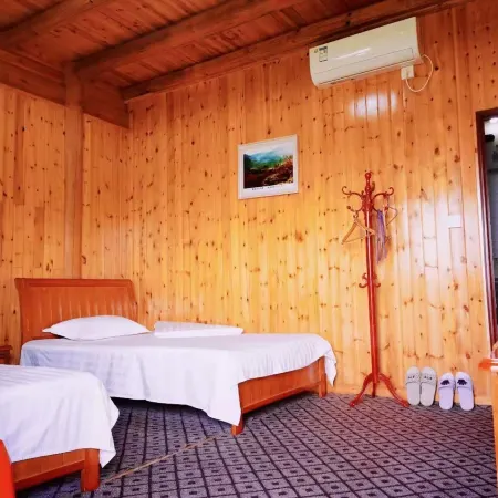 Jinxiu Leisure Guesthouse Отели в г. Синьхуа