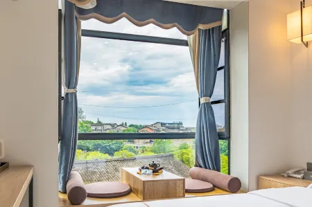 Residents' accommodation in Libo, Hongya Отели рядом с достопримечательностью «Gaomiao Ancient Town»