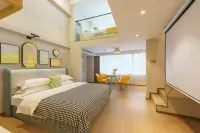 Dalian Xinghai Square Qingchen Floating Light Luxury Hotel Apartment - con vista montagne