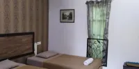 Capital O 90523 Semeliang Village Resort - Standaard Drievoudige Kamer