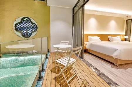 Guiyuan Homestay (Zhaoqing Qixingyan Xinghu Scenic Area Branch) Отели рядом с достопримечательностью «Qixingyan Archway Square»